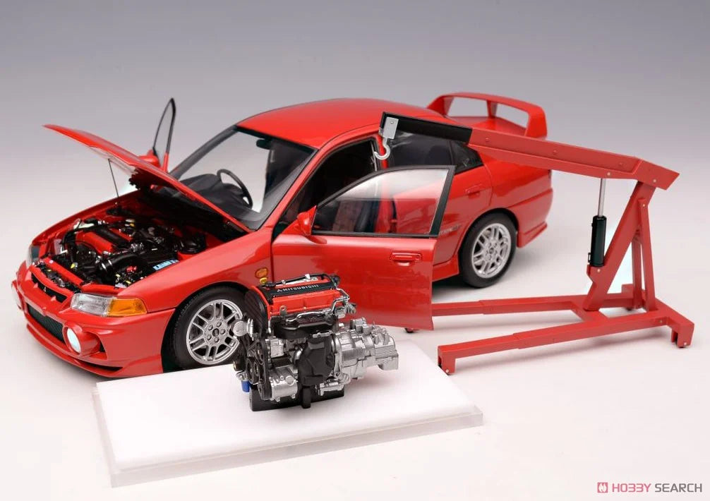 MotorHelix 1:18 Mitsubishi Lancer Evolution IV in Palma Red