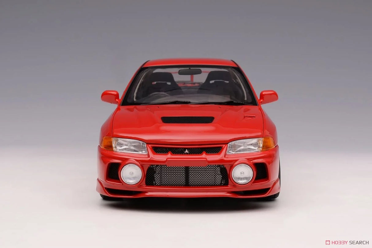 MotorHelix 1:18 Mitsubishi Lancer Evolution IV in Palma Red