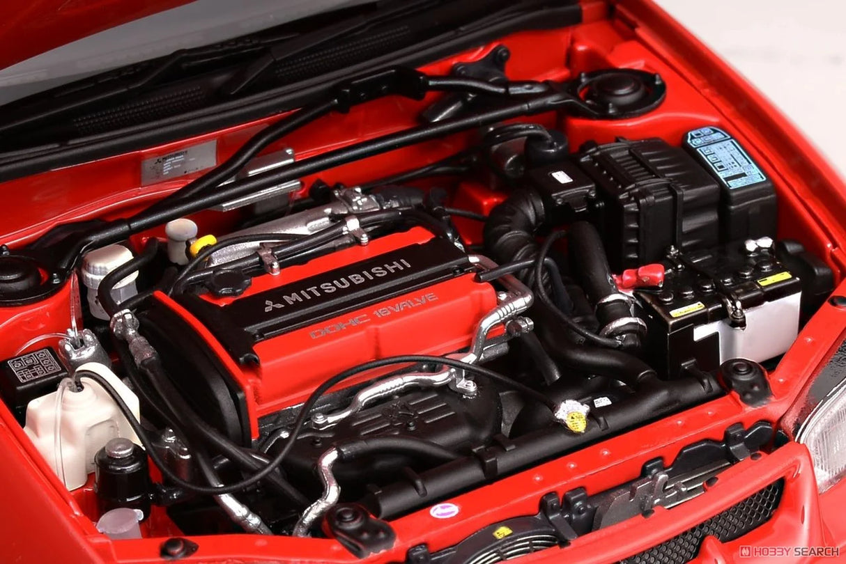 MotorHelix 1:18 Mitsubishi Lancer Evolution IV in Palma Red
