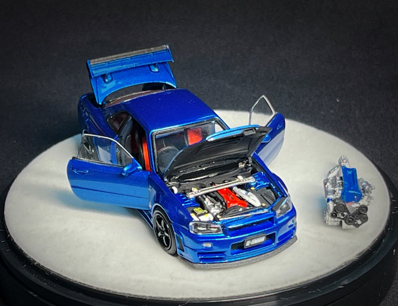 PGM 1:64 Nissan Skyline GT-R (R34) in Bayside Blue Luxury Version