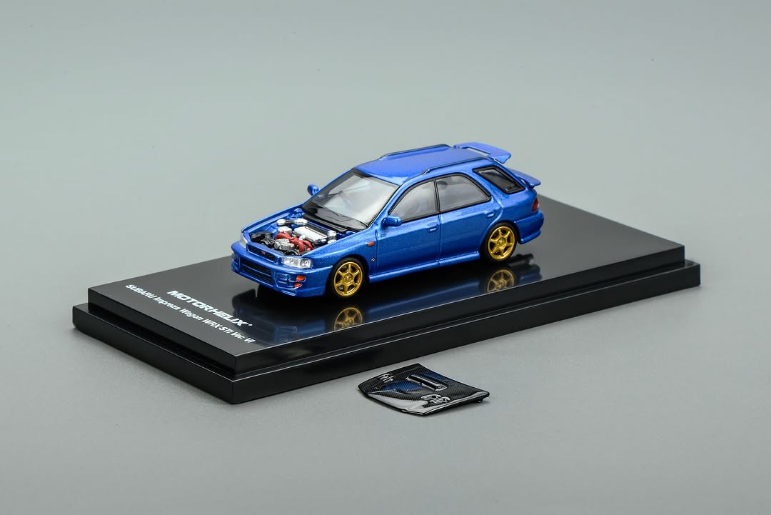 *PREORDER* MotorHelix 1:64 Subaru Impreza Wagon WRX STi Ver. VI Customized in World Rally Blue Mica with Carbon Bonnet