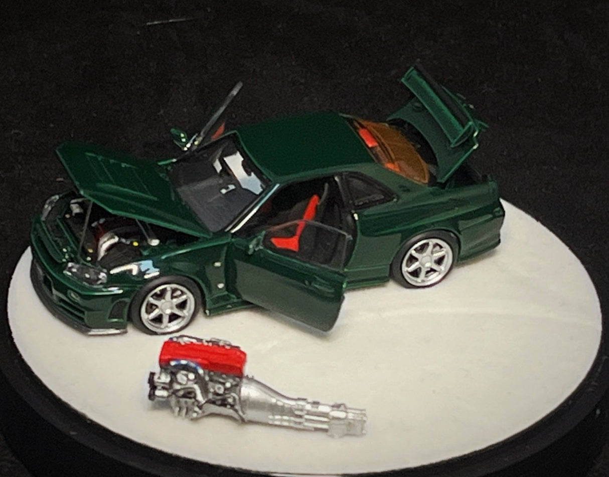 PGM 1:64 Nissan Skyline GT-R (R34) in British Green Luxury Version