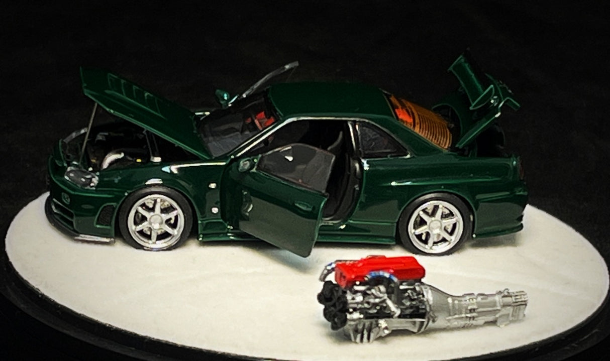 PGM 1:64 Nissan Skyline GT-R (R34) in British Green Luxury Version