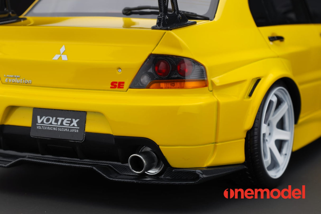 One Model 1:18 Mitsubishi Lancer Evolution IX Voltex with Carbon Bonnet in Yellow