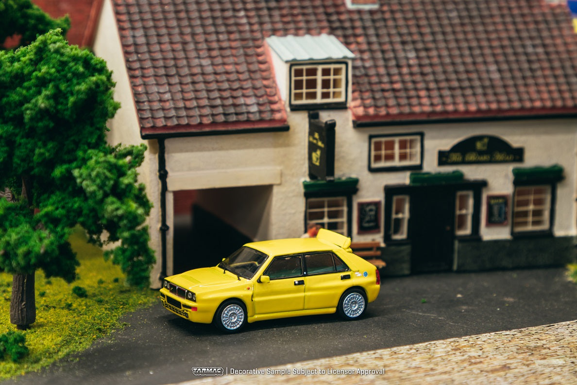 Tarmac Works 1:64 Lancia Delta HF integrale, Giallo Ginestra in Yellow