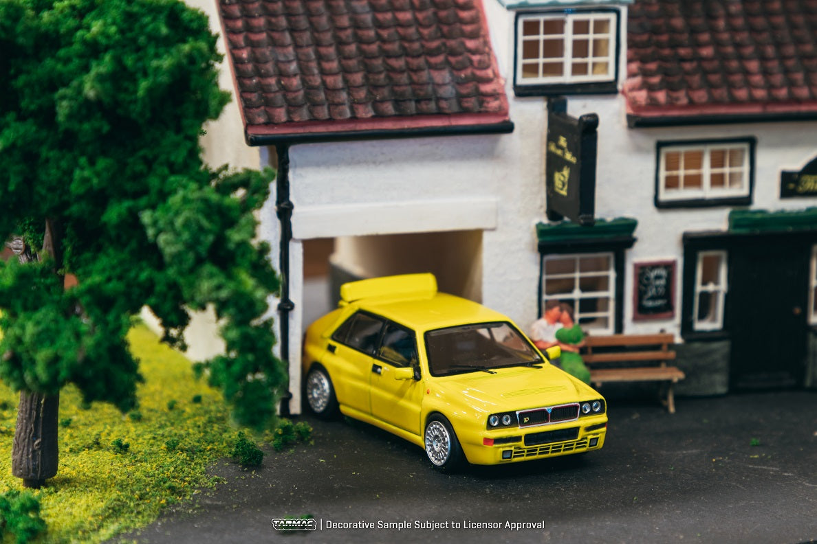 Tarmac Works 1:64 Lancia Delta HF integrale, Giallo Ginestra in Yellow