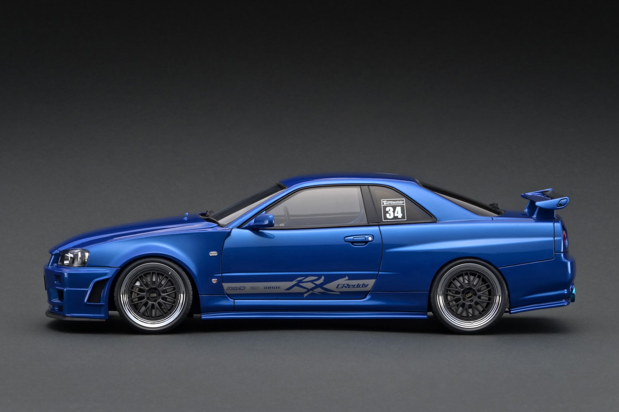 イグニッションモデル　1/18 TRUST GReddy 34RX photo3L.jpg