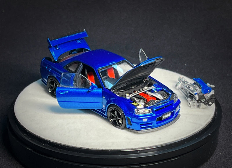 PGM 1:64 Nissan Skyline GT-R (R34) in Bayside Blue Luxury Version