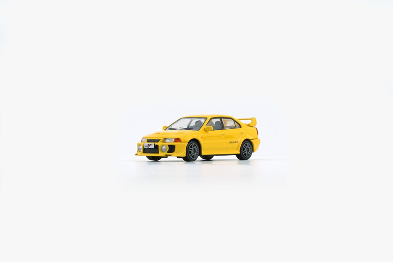 BM Creations 1:64 Mitsubishi Lancer EVO V / VI (RHD) in Yellow