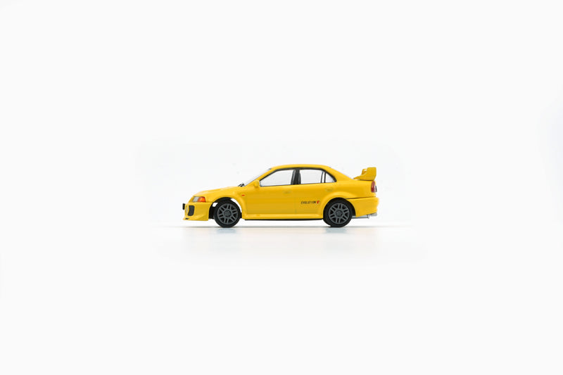 BM Creations 1:64 Mitsubishi Lancer EVO V / VI (RHD) in Yellow