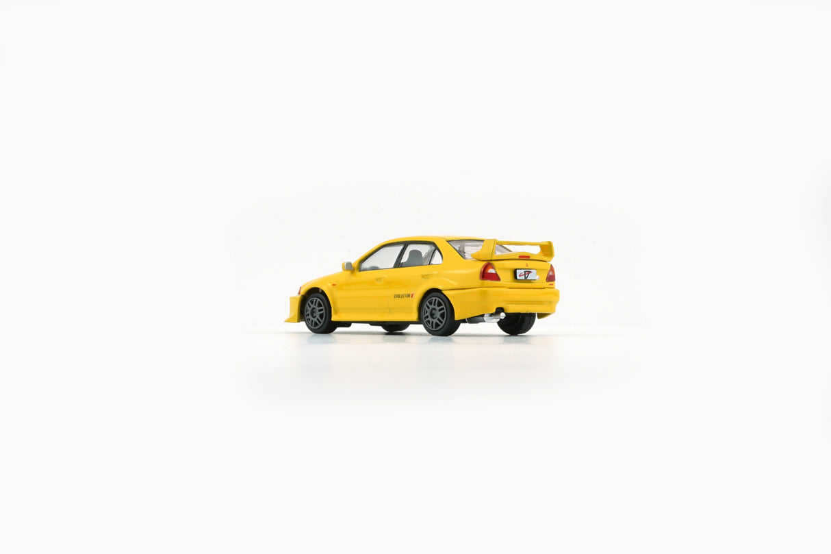 BM Creations 1:64 Mitsubishi Lancer EVO V / VI (RHD) in Yellow