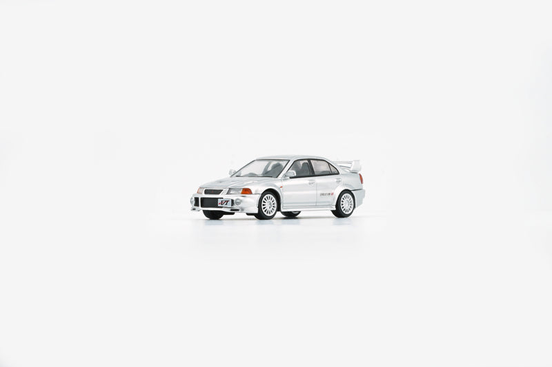 BM Creations 1:64 Mitsubishi Lancer EVO V / VI (RHD) in Silver