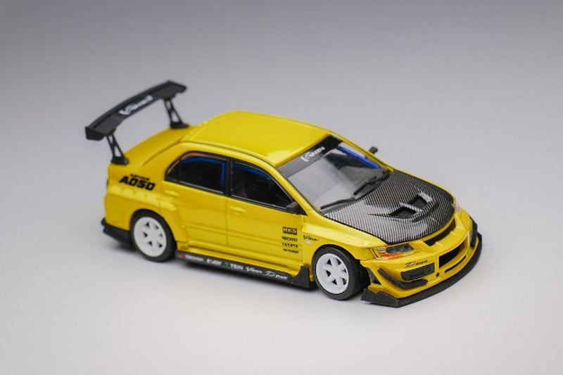 Peako Models 1:64 Mitsubishi Lancer Evolution IX Varis Edition in Yellow Metallic