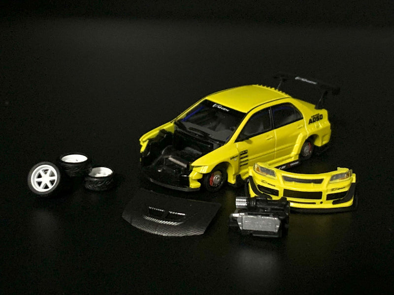 Peako Models 1:64 Mitsubishi Lancer Evolution IX Varis Edition in Yellow Metallic