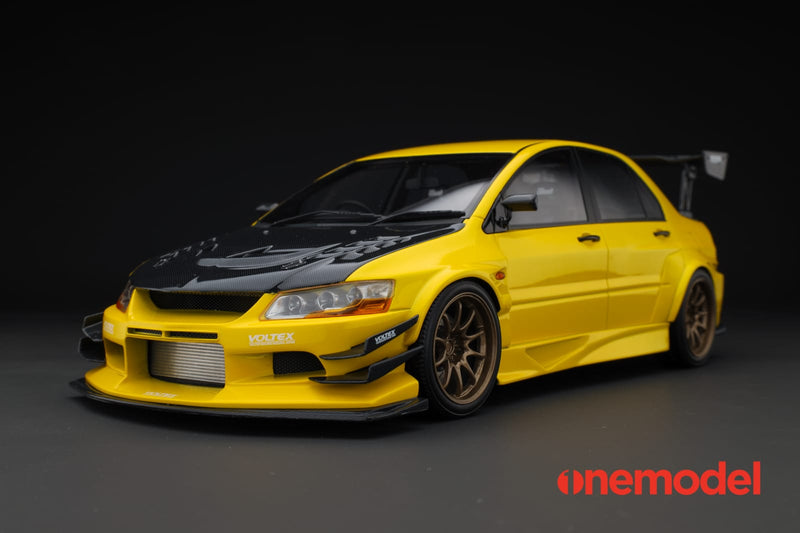 One Model 1:18 Mitsubishi Lancer Evolution IX Voltex with Carbon Bonnet in Yellow