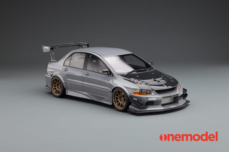 One Model 1:18 Mitsubishi Lancer Evolution IX Voltex with Carbon Bonnet in Cement Gray