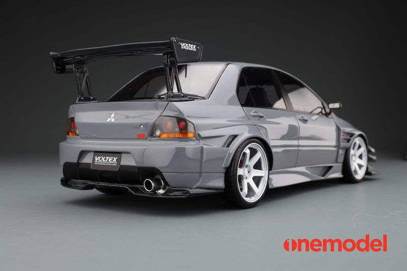 One Model 1:18 Mitsubishi Lancer Evolution IX Voltex with Carbon Bonnet in Cement Gray