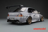 One Model 1:18 Mitsubishi Lancer Evolution IX Voltex with Carbon Bonnet in Cement Gray