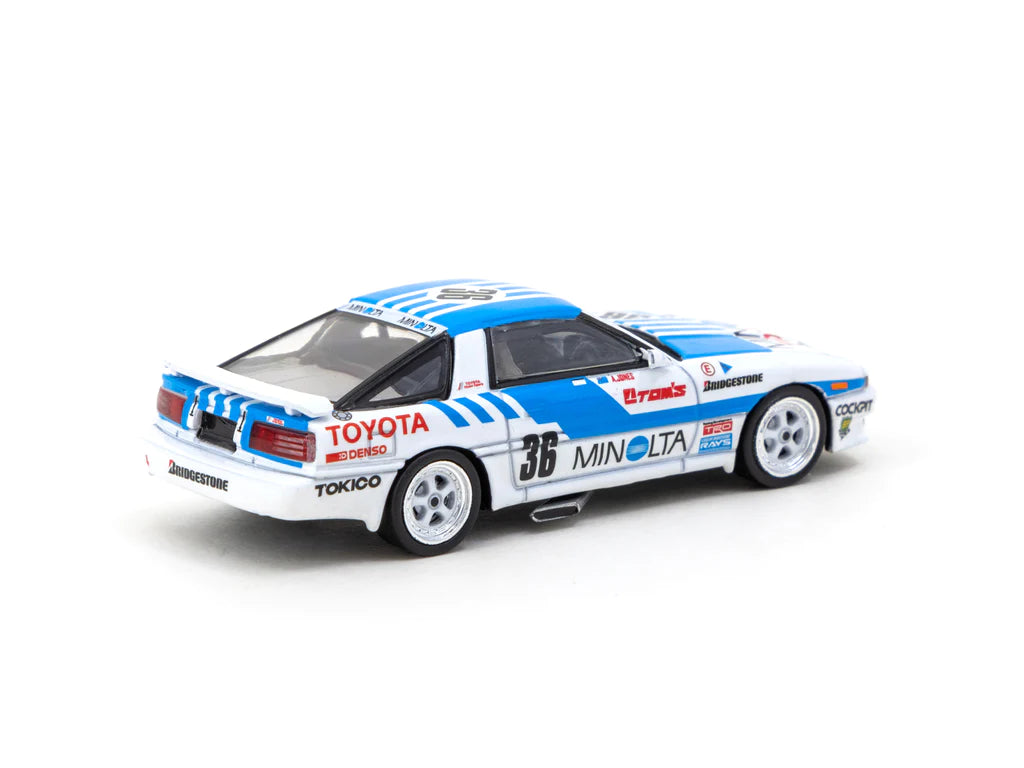Tarmac Works 1:64 Toyota Supra MA70 Macua Guia Race 1987 Alan Jones